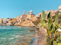 Stunning pastel neoclassical mansions rising above the harbor of Ermoupoli in Syros, a top destination among the best Greek islands for couples in 2026 seeking culture.